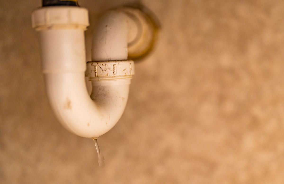 Drip at trap slip joint, hall bathroom